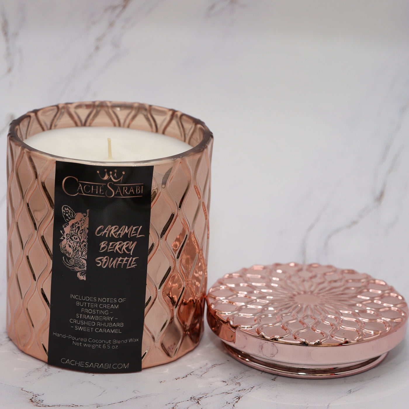 Indulge in the Caramel Berry Souffle dressed in an elegant rose gold vessel, with its delicious scent notes of butter cream frosting, strawberry, and sweet caramel. 